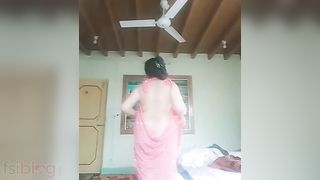 Super sexy aunty striptease in nature's garb MMS