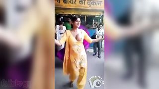 Stunning Indian aunty XXX strip dances around with one of her tits out