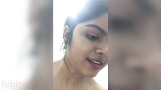 Nice Desi girl with pink lips touches XXX parts in the shower room