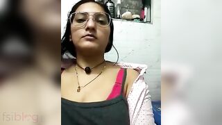 Desi slut with glasses reveals her huge XXX boobs for live show