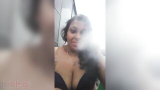 Clip of Desi whore with XXX shaped knockers exploiting bong becomes MMS