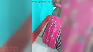 Hot like hell Desi female in sexy pink dress poses for the camera