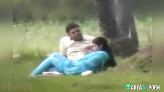 Beautiful Indian wife in blue saree with her lover in public park